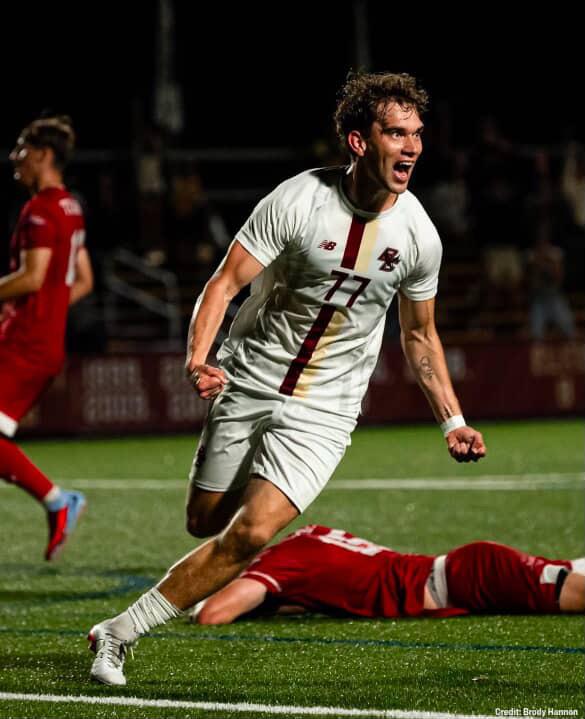 SAGA player celebrating a goal for Boston College